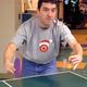 Self-described "ping-pong ninja" Tim Bergkamp taunts his opponent during a match at Appleton-area fun center B.Z. Bonkers.
